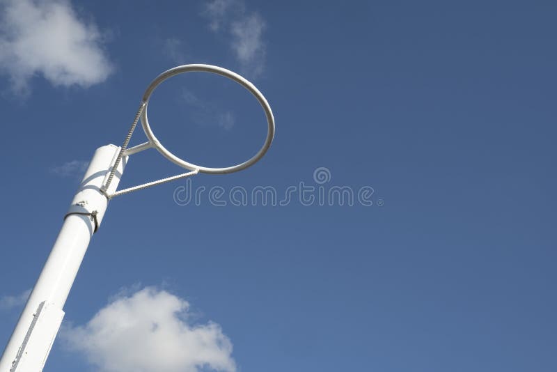 Netball ring against blue sky
