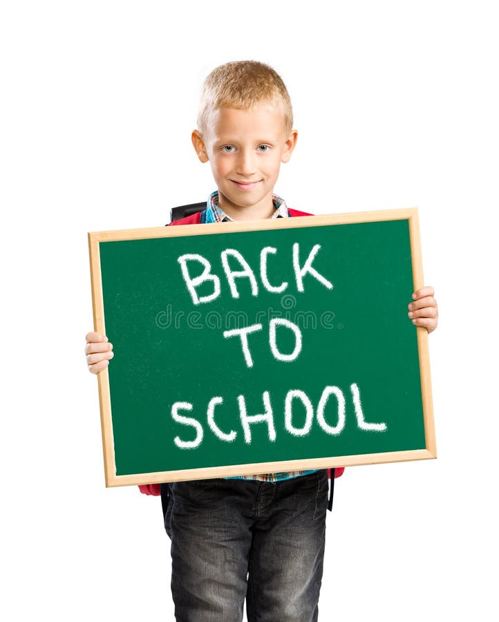 Netter Junge, der ein Zeichen sagt zurück zu Schule hält lizenzfreie stockfotografie Netter Junge, der ein Zeichen sagt zurück zu Schule hält lizenzfreie stockfotografie