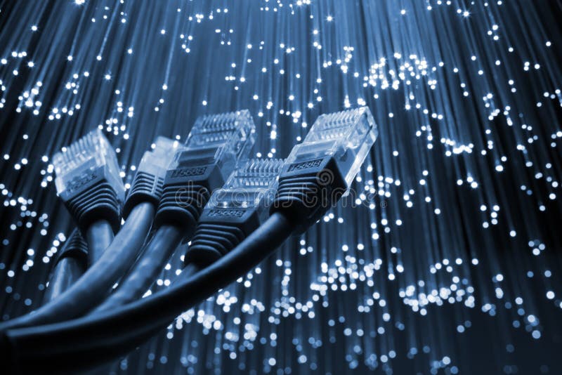 Network cabe. Fiber optics background with lots of light spots Network cabe. Fiber optics background with lots of light spots