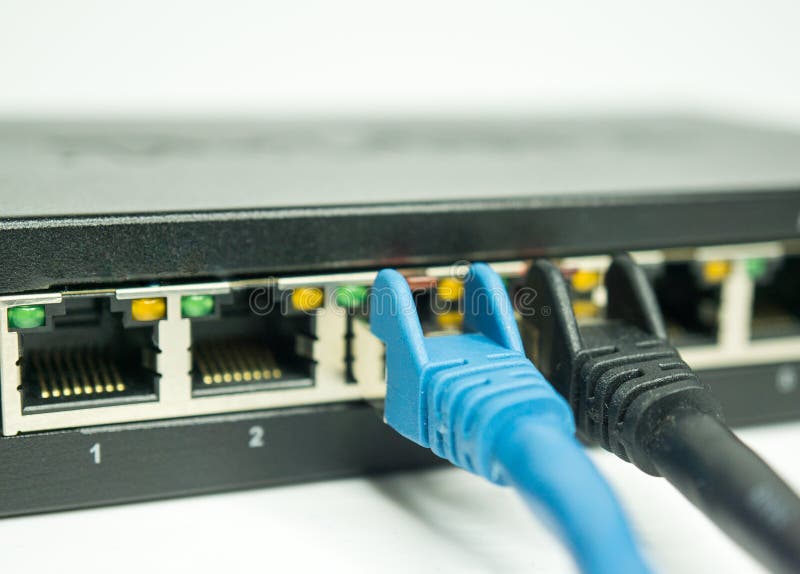 Network Cable and Ports of a Switch Stock Photo Image of black