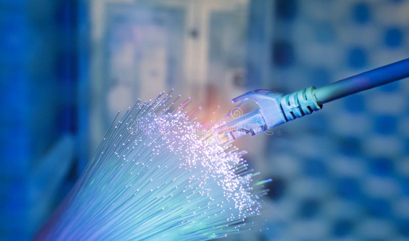 Network cables with fiber optical technology background stock images