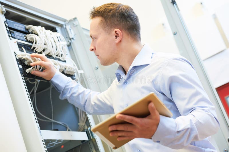 Network engineer admin at data center stock photography Network engineer admin at data center stock photography