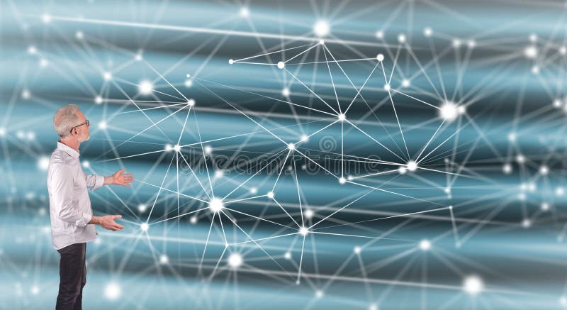 A network explained by a businessman on a wall screen royalty free stock image A network explained by a businessman on a wall screen royalty free stock image