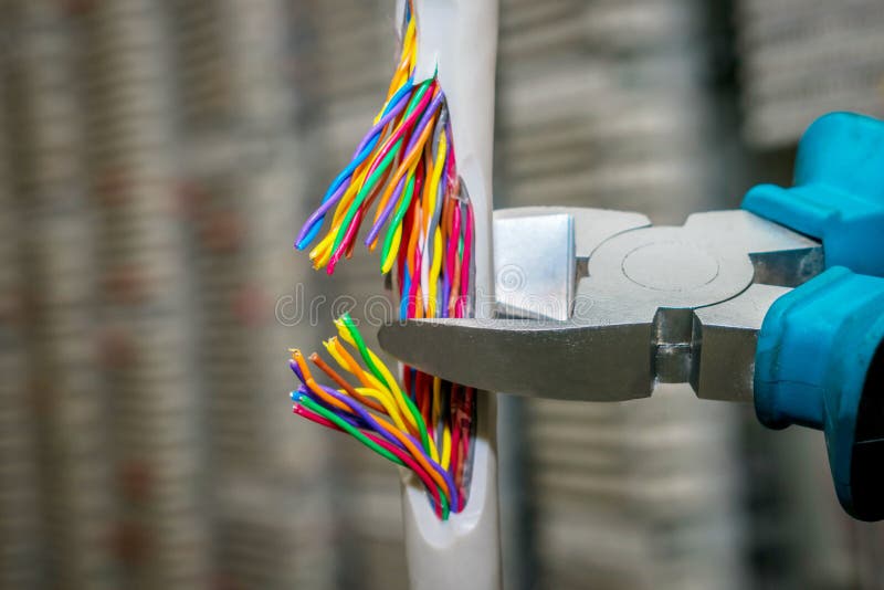 Network Cable is Torn with a Sharp Tool. the Concept of Vandal