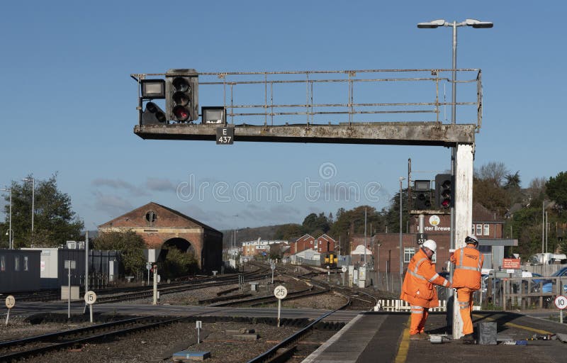 Network Rail Workers Work on a Signal Gantry Editorial Stock Photo