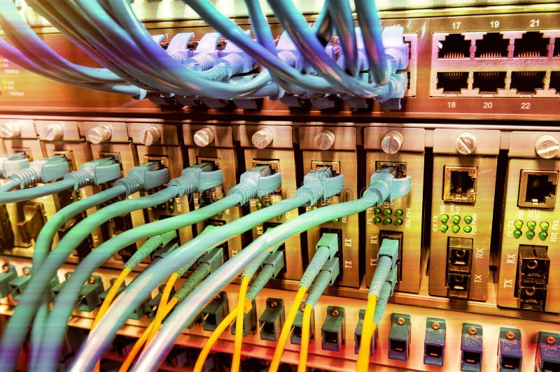 Network switch and ethernet cables royalty free stock photo