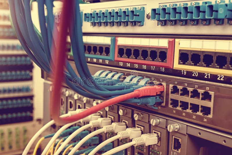 Network switch and ethernet cables stock photos