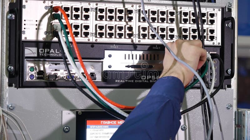 Networking service. network engineer administrator checking server hardware equipment of data center.