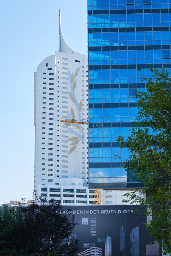 Neue Donau residential building next to an office tower, in Donau City 22 district - frontal view stock photography Neue Donau residential building next to an office tower, in Donau City 22 district - frontal view stock photography
