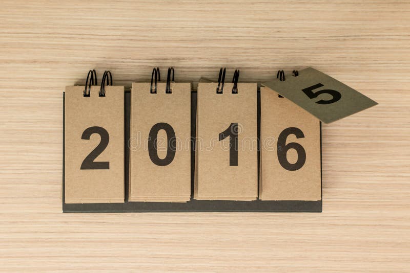 New Year 2016 is coming concept. Happy New Year 2016 replace 2015 concept on wooden background. New Year 2016 is coming concept. Happy New Year 2016 replace 2015 concept on wooden background.