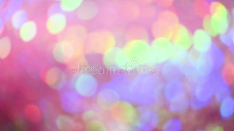 Neues Jahr und Weihnachtsbeschaffenheit Bunter unscharfer bokeh Hintergrund der Lichterkette Festliche Grußkarte stock video