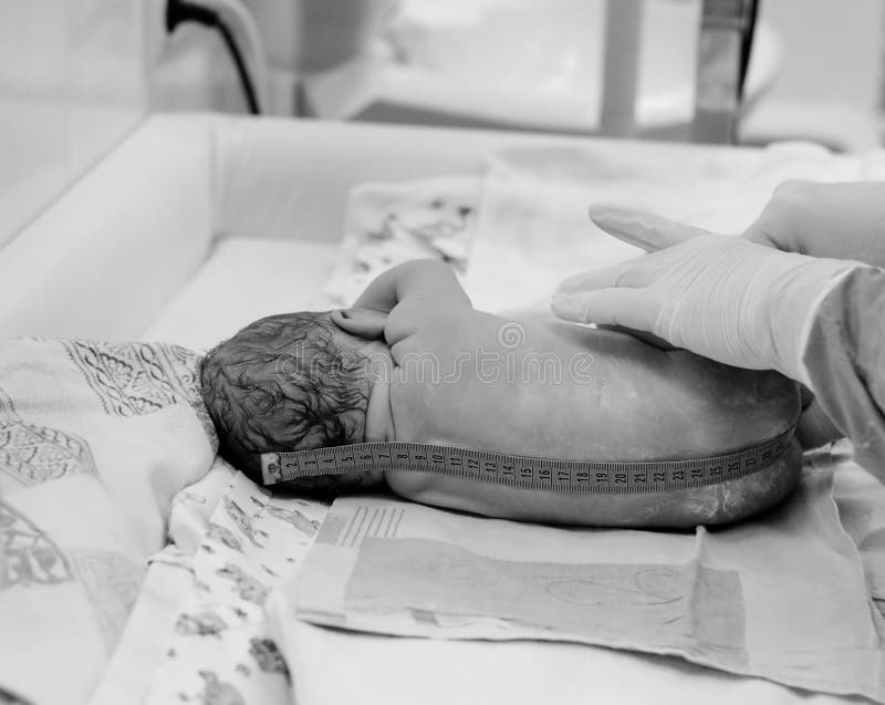 Black and white shot of newborn baby right after delivery. Black and white shot of newborn baby right after delivery