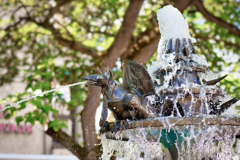 Neustadt an der Weinstrasse, Germany - August 2022: Sculpture at 'Elwedritsche Brunnen' fountain. Elwedritsche are a mythical creature mix of chickens, ducks, geese, goblins and elves from Palatinate. Neustadt an der Weinstrasse, Germany - August 2022: Sculpture at 'Elwedritsche Brunnen' fountain. Elwedritsche are a mythical creature mix of chickens, ducks, geese, goblins and elves from Palatinate