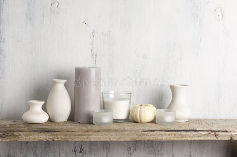 Neutral colored vases and candles as home decor royalty free stock images Neutral colored vases and candles as home decor royalty free stock images