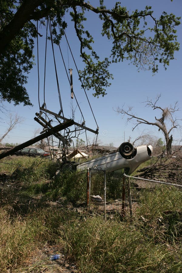 A heavily lot in the Ninth Ward of New Orleans. All that remains on the lot is an overturned automobile where a home once stood. Downed power lines hang over the property. A heavily lot in the Ninth Ward of New Orleans. All that remains on the lot is an overturned automobile where a home once stood. Downed power lines hang over the property.