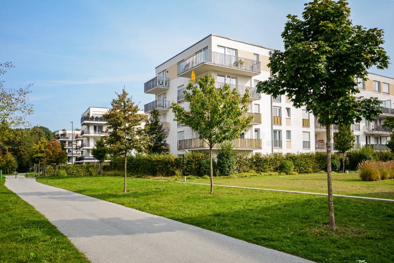 New apartment building - modern residential development in a green urban settlement