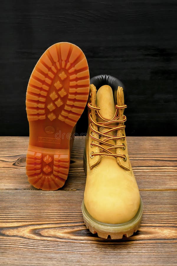 Scheermes walvis Anzai New Beautiful Brown Yellow Warm Winter Timberland Tracking Shoes, Boots,  Sneakers, Trainers Logo on Wooden Background with Rubber Editorial Stock  Image - Image of modern, trekking: 239451424