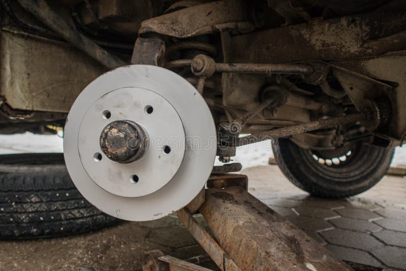 New brake disc on a car stock image. Image of metal 185367959
