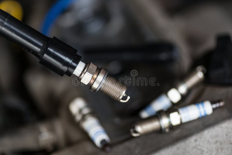 New car spark plugs. stock photo. Image of steel, service 122045218