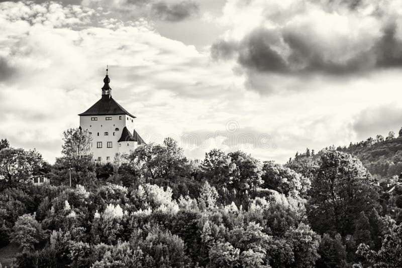 New Castle with forest in sunset, Banska Stiavnica, colorless