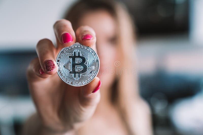 New Crypto Currency Coins In Hand. Stock Photo - Image of ...