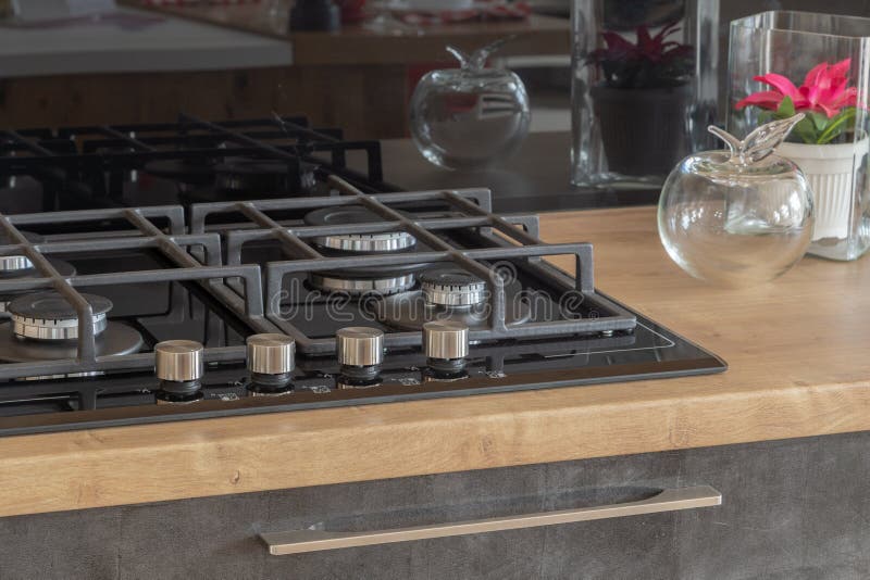 New design of built-in oven and cooker in the kitchen.