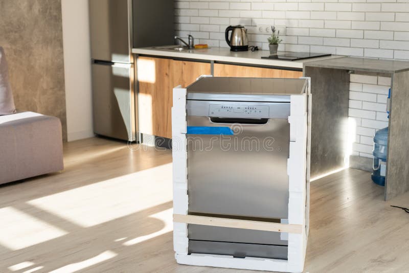 New Dishwasher in Modern Kitchen. Stock Photo Image of stainless