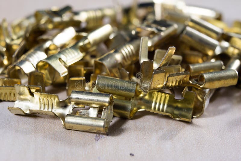 New electrical connectors. Accessories for electrical installations on a wooden workshop table. stock image