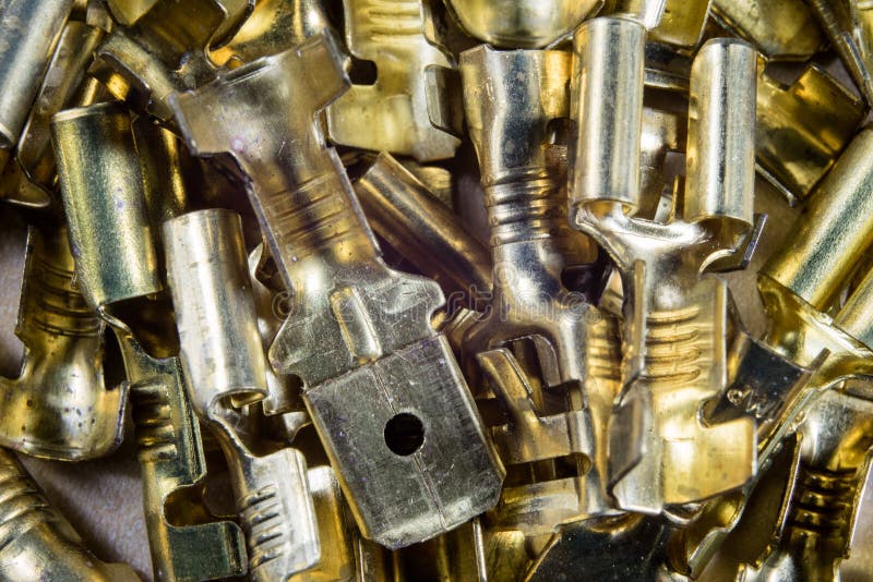 New electrical connectors. Accessories for electrical installations on a wooden workshop table. royalty free stock images