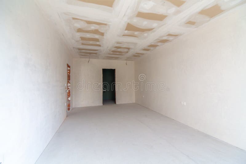 Empty Room Under Construction. Plaster Walls. New Home. Concrete Walls