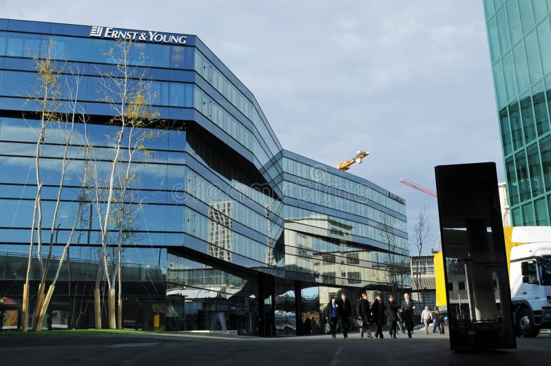 The New Ernst & Young Headquarter in ZÃ¼rich-West in the Shadow of the  Swiss Prime Tower Stock Photo - Image of swiss, gold: 147464220