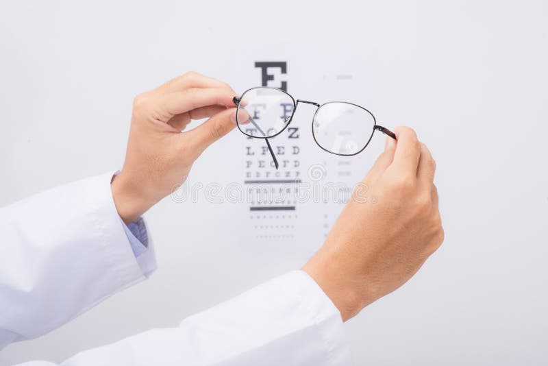 New Glasses Optometrist Giving Eyeglasses To Try Stock Image Image Of Optic Doctor 104266047