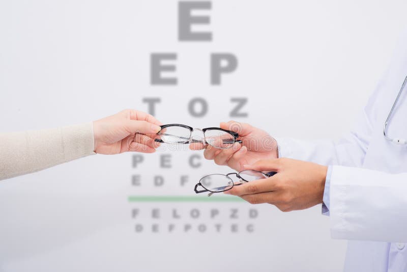 New Glasses Optometrist Giving Eyeglasses To Try Stock Image Image Of Professional Optical