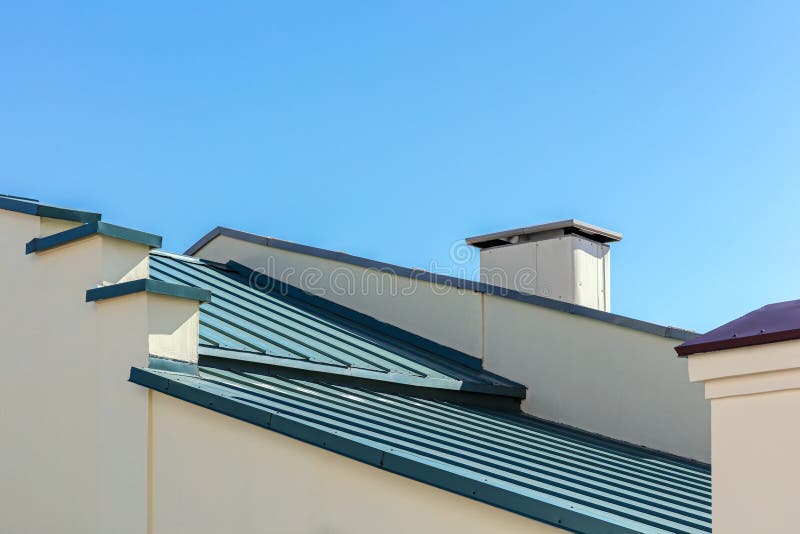 New gray corrugated metal roof against blue sky background royalty free stock photos New gray corrugated metal roof against blue sky background royalty free stock photos
