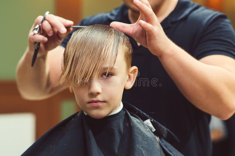 New Hairstyle for Young Boy. Barber Shop Stock Image - Image of shop,  handsome: 201661831