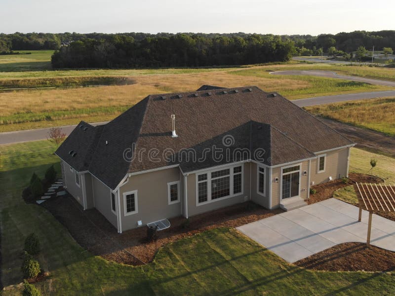 New home construction from above. Aerial view of suburban house. American neighborhood, suburb. Summer, sunny day stock photos New home construction from above. Aerial view of suburban house. American neighborhood, suburb. Summer, sunny day stock photos