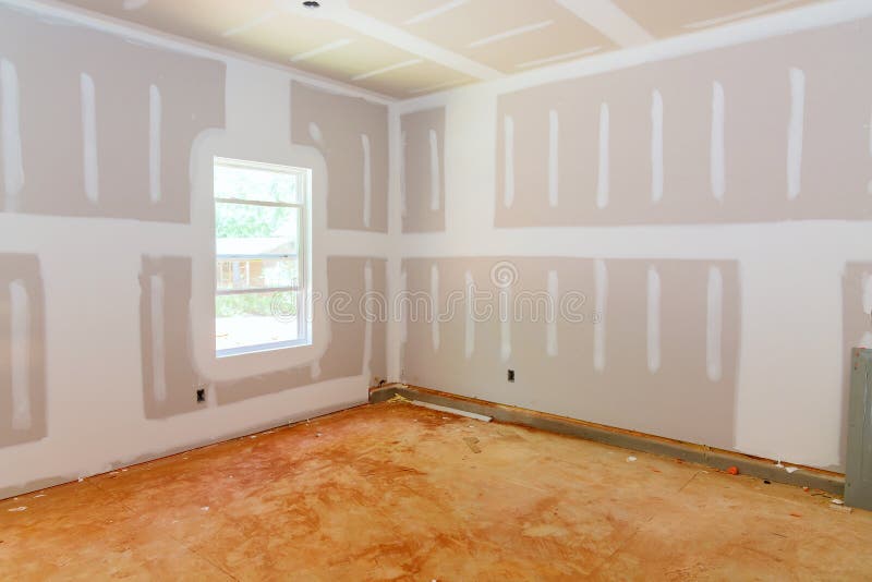 Finishing Plastering Drywall in Ready for Paint with New House Stock