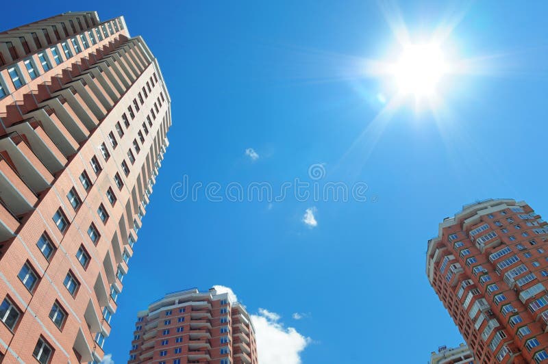 New houses against shiny sky