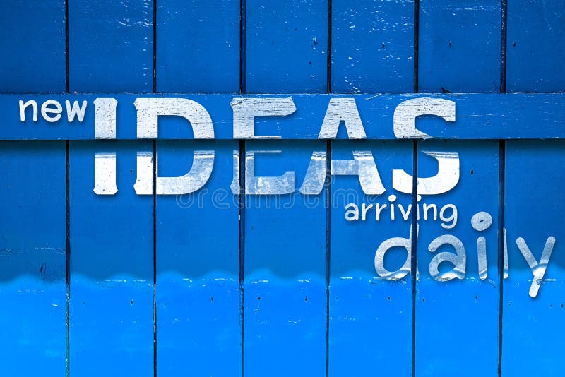 New idea text on yellow Old Wood Background