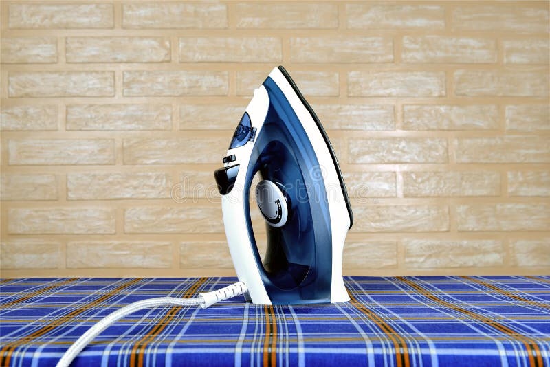 New Modern Electric Steam Iron on Ironing Board Stock Image Image of