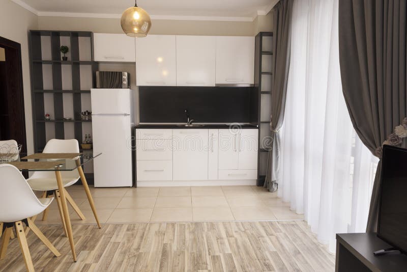 New modern living room with kitchen. New home. Interior photography. Wooden floor stock image New modern living room with kitchen. New home. Interior photography. Wooden floor stock image