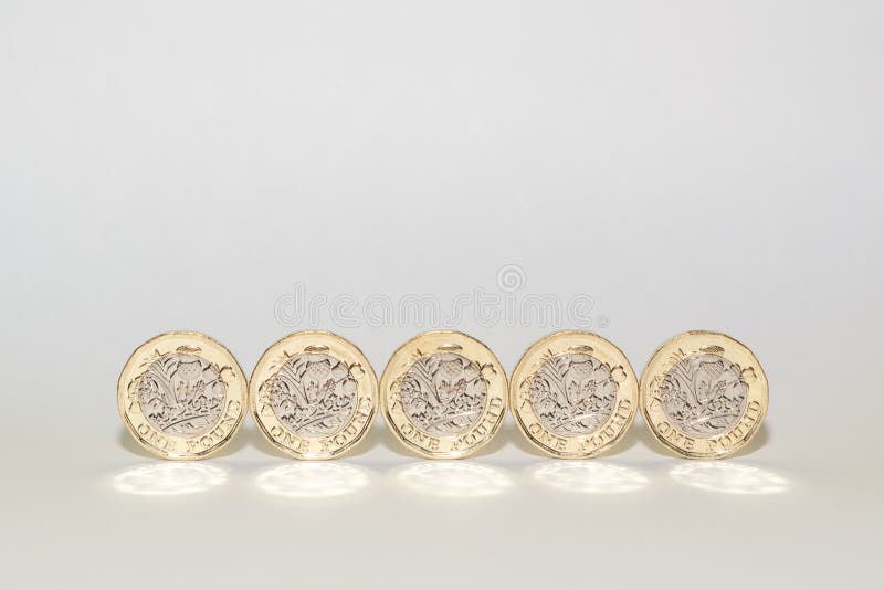 The set of new one pound coins in the UK. Decagon stock images, royalty-free photos and pictures