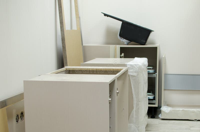 New Open Kitchen Furniture Prepared for Assemble. Installation of