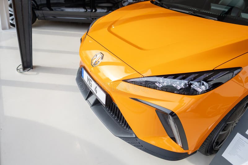 New orange Car MG4 Electric, Motor UK Limited Nanjing, high-performance Automobile in showroom, sustainable development EV, Innovation automotive industry show in Wiesbaden, Germany - January 25, 2024. Development ev stock images, royalty-free photos and pictures