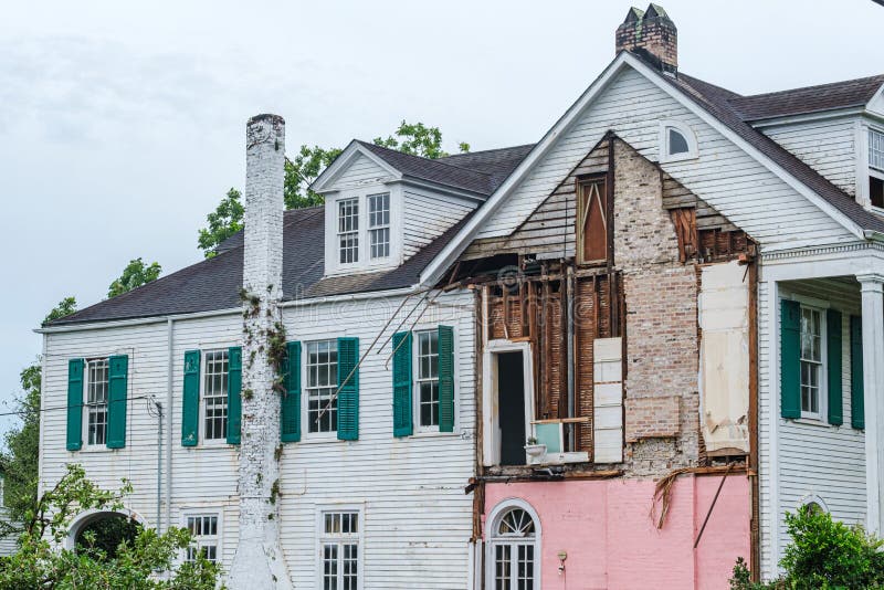 New Orleans, Louisiana/USA - 7/25/2020: Partial Demolition of Old House on Burdette Street in Uptown Neighborhood. New Orleans, Louisiana/USA - 7/25/2020: Partial Demolition of Old House on Burdette Street in Uptown Neighborhood