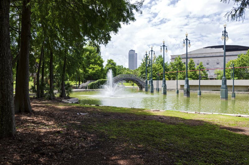 New Orleans Park and Pond With Fountain and Bridge