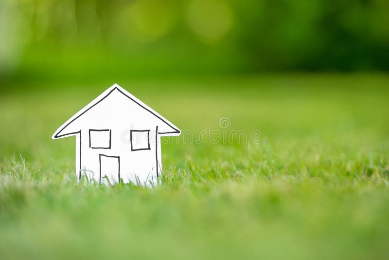 New paper house in grass
