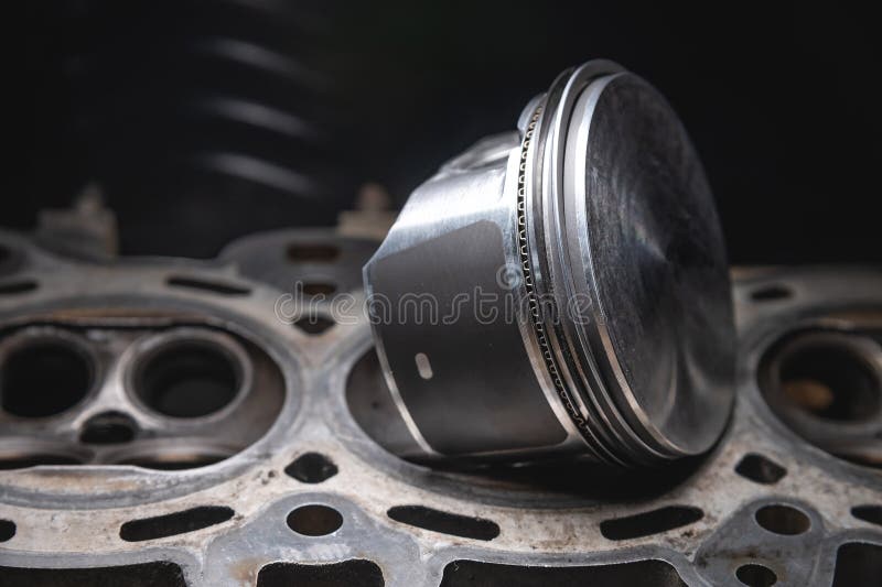 The New Piston Lies On The Cylinder Head Of The Engine Stock Image The New Piston Lies On The Cylinder Head Of The Engine Stock Image