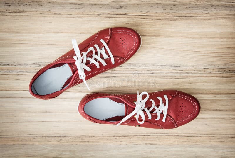 New Red Women S Leather Shoes on the Wooden Background Stock Image ...