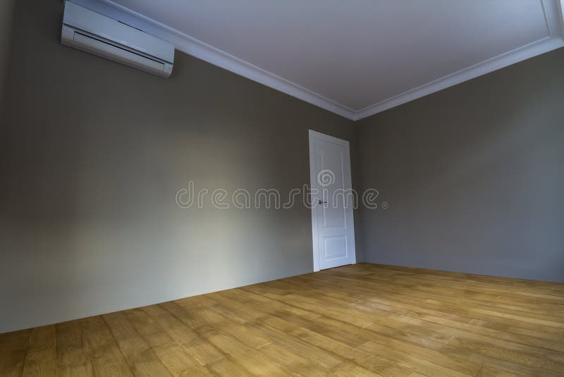 New renovated room interior with freshly painted walls, white do